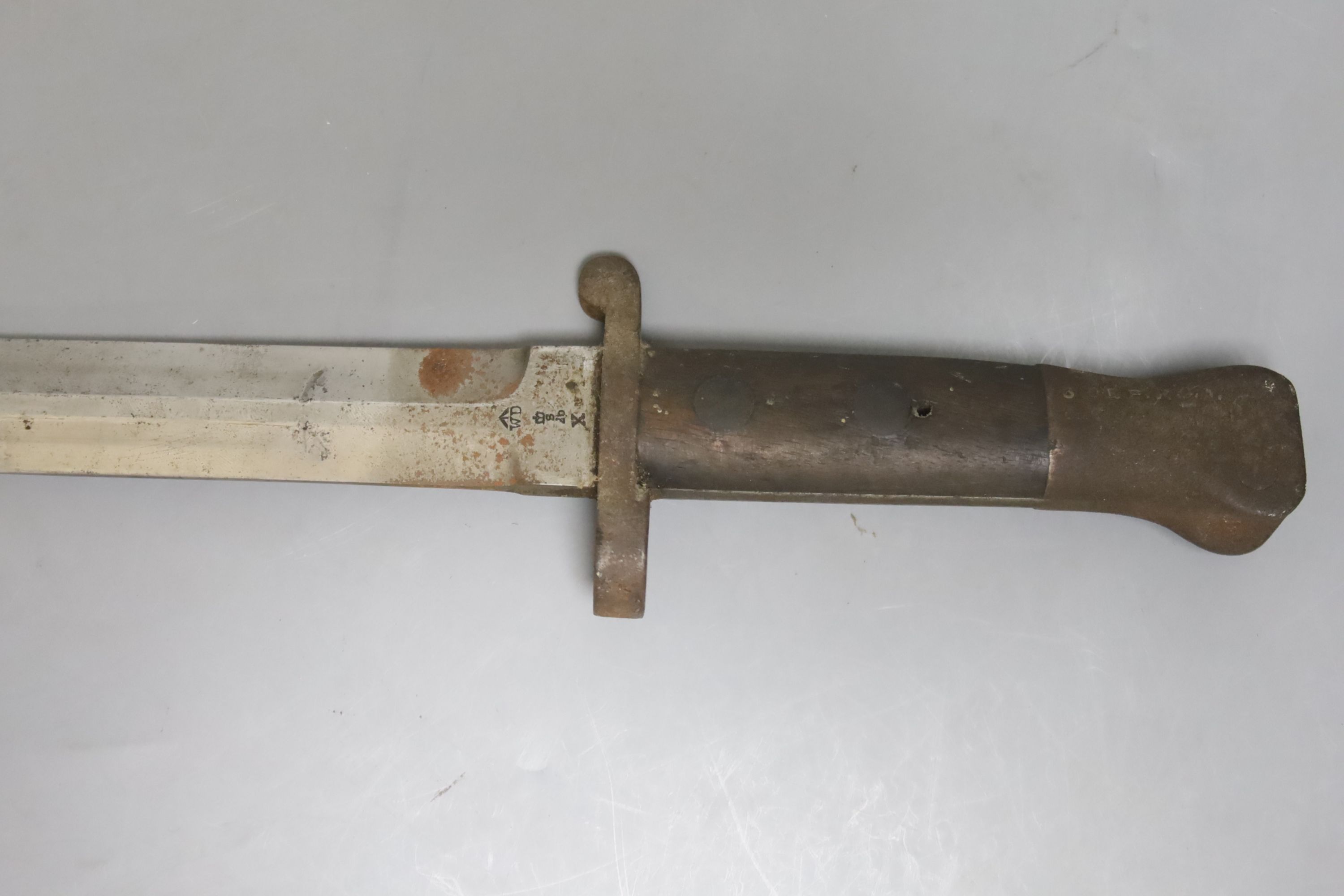 A 19th century French bayonet, together with an early 20th century English bayonet and a ‘Remember The Alamo 1836 The Stand of Colonel Jim' Bowie knife